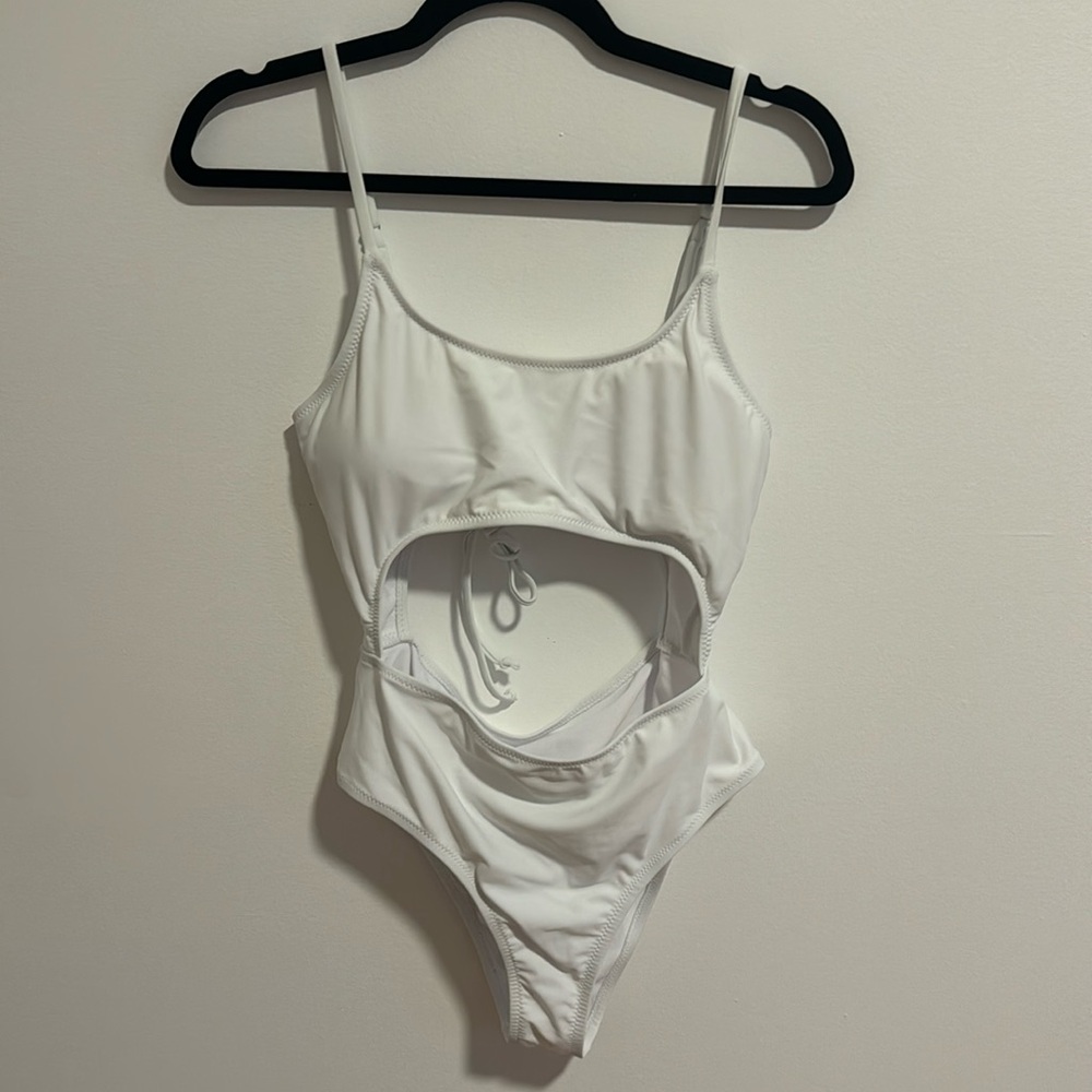 White one piece swimsuit.
